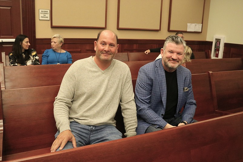 Anthony's Restaurant owner Anthony Foster, left, and Sea Isle City developer Christopher Glancey reach a deal on the liquor license.