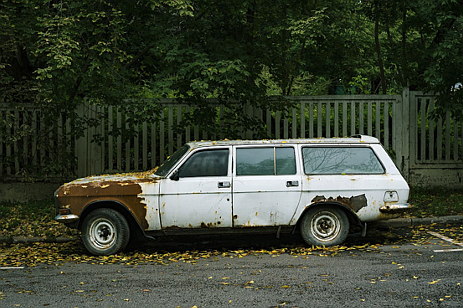 Image source - https://www.pexels.com/photo/junked-white-station-wagon-parked-on-the-roadside-11150215/