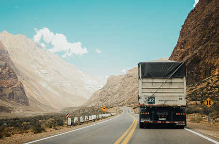 Image source - https://unsplash.com/photos/white-and-black-truck-near-mountain-at-daytime-lq9PxpwDZUk