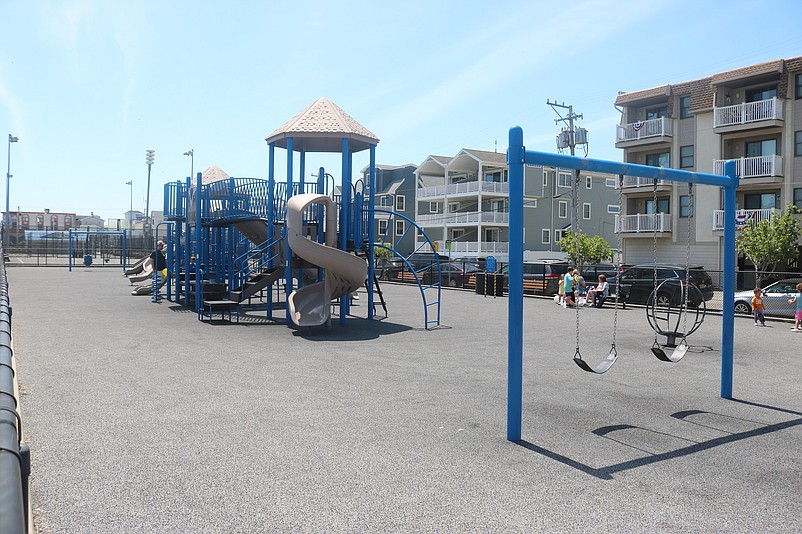 The playground on JFK Boulevard includes swings, slides and other play equipment