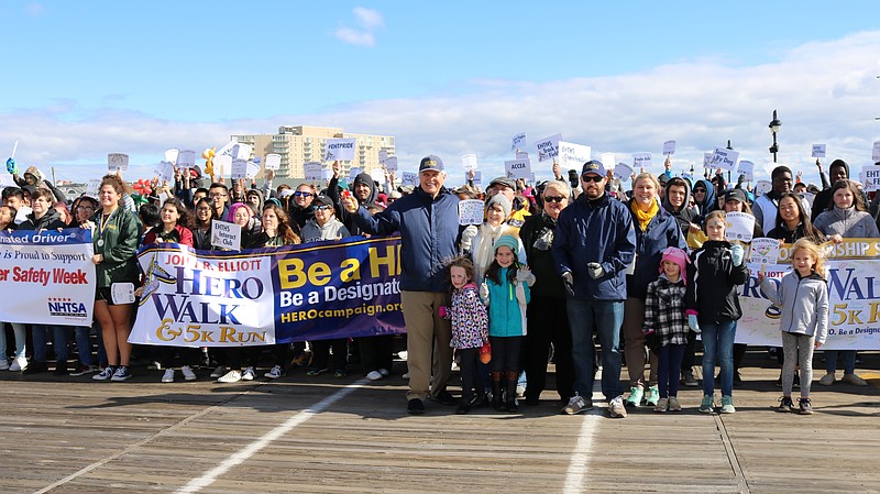 The Elliott family leads the procession.