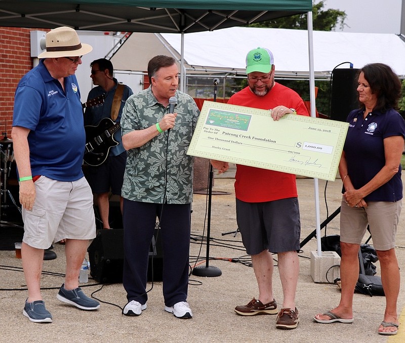 Talk Show Host Harry Hurley is Patcong Creek Foundation's Patron of the Year for his contributions to the foundation. He is in the middle. Somers Point Mayor Jack Glasser is on the, left, and Patcong Creek Foundation Founder Ron Meischker and Freeholder Maureen Kern are to the right. (Photos courtesy Patcong Creek Foundation)