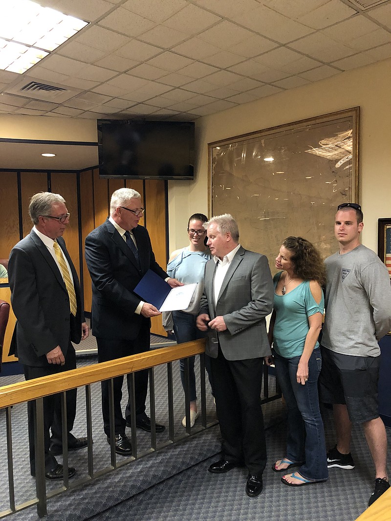 Council President Sean McGuigan receives a proclamation from Mayor Jack Glasser and council members. (Courtesy City of Somers Point)