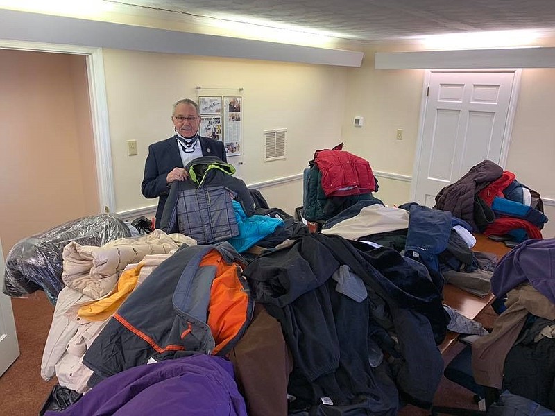 Assemblyman John Armato with coats collected for Jersey Cares in 2018.