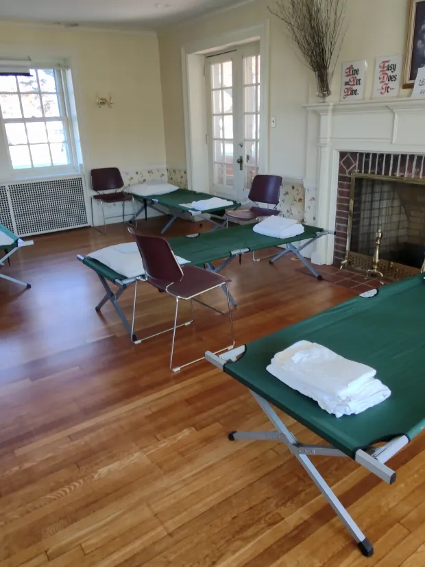 Cots stand inside a room at Trinity Lutheran Church's Luther Hall, awaiting men in need of a place to stay during Code Blue nights. (Photo courtesy of Mark Lanan)