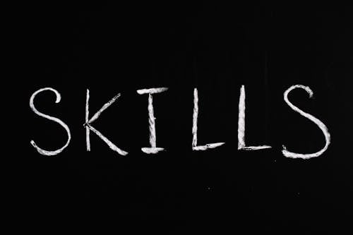 Free Skills Text on Black Background Stock Photo