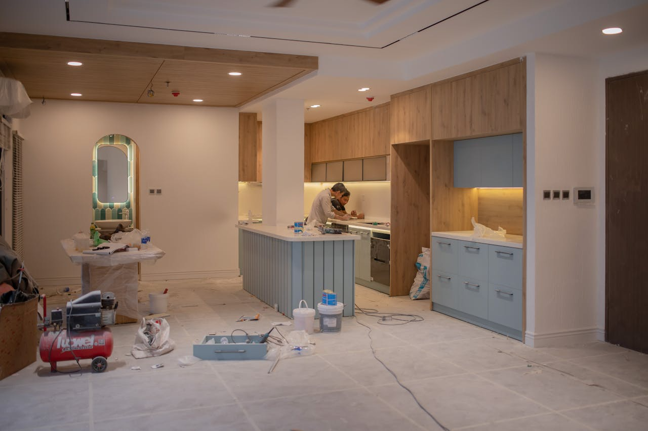 Men Repairing Inside a House