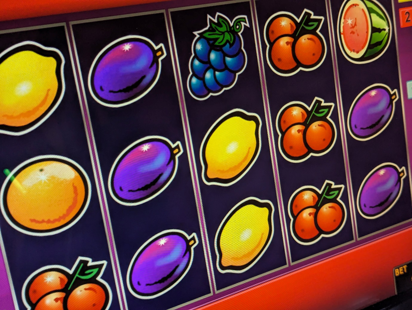 A close up of a slot machine

AI-generated content may be incorrect.