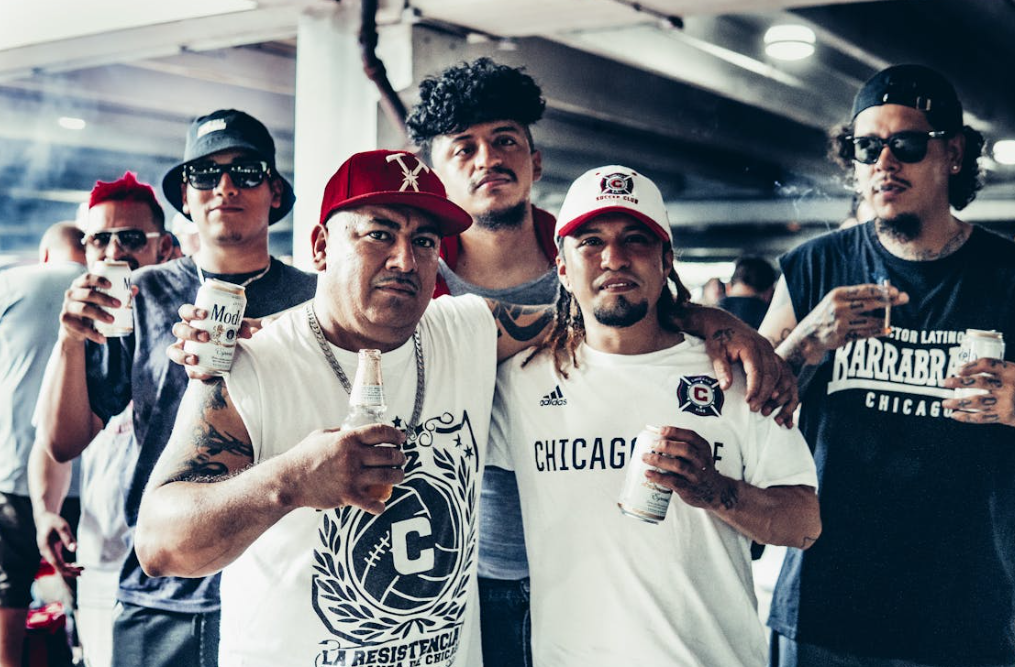 Chicago Cubs fans wearing different types of fan jerseys