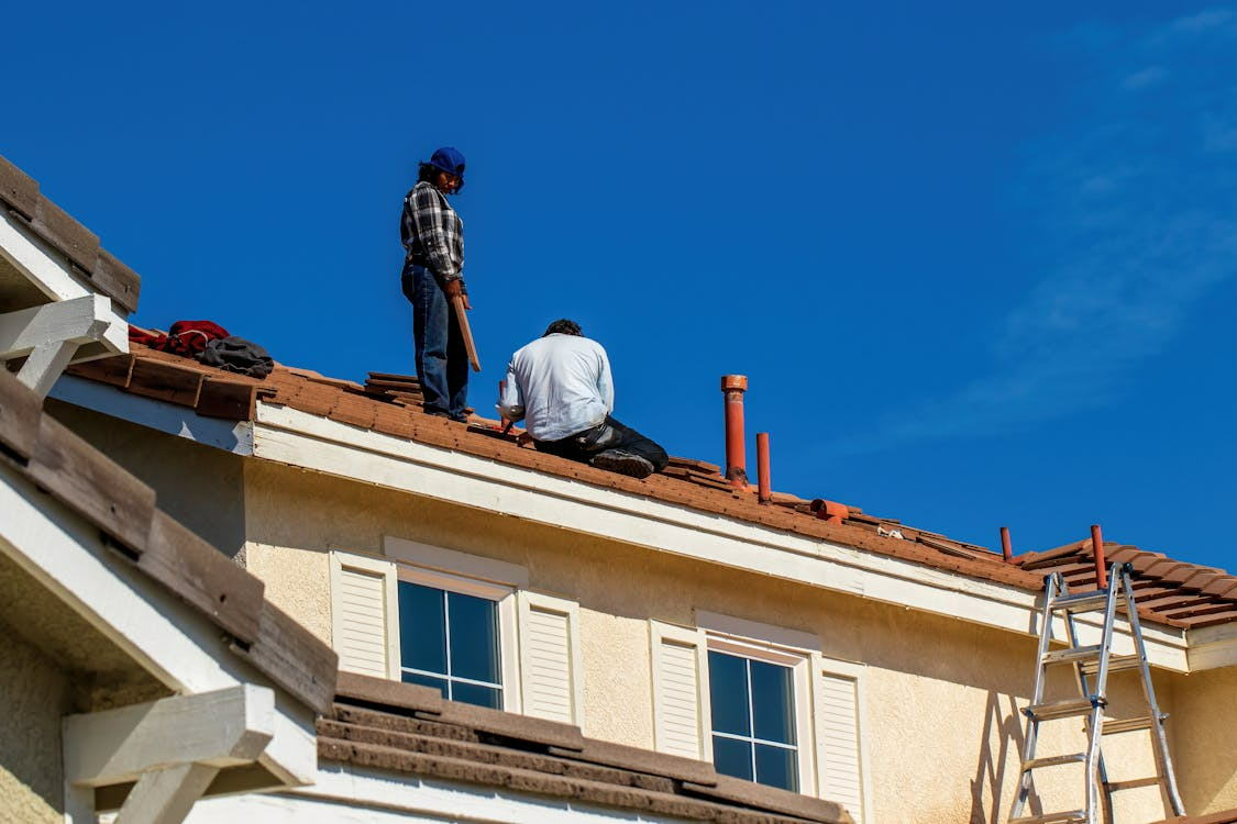 Call a Roofing Company vs. Doing It Yourself