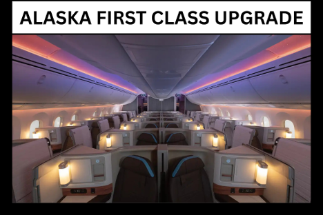 Alaska Airlines First Class cabin interior featuring spacious leather seats and ample legroom, showcasing the premium upgrade experience.