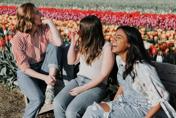 Picture of women sitting on a bench 